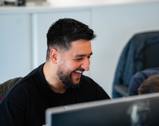 man looking at computer screen