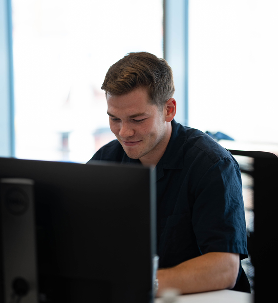 Guy staring at laptop